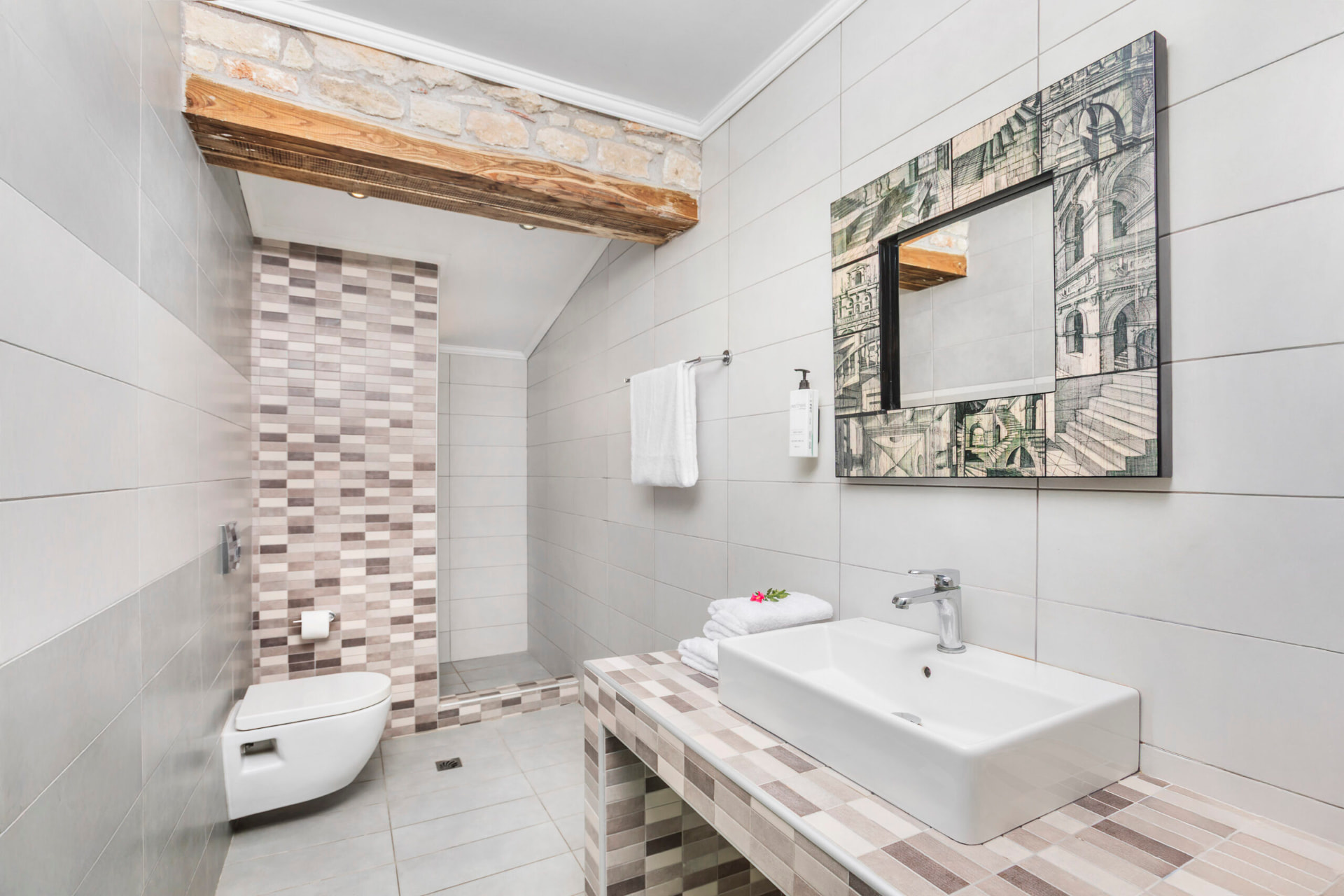 Bathroom with mosaic vanity and walk-in shower.