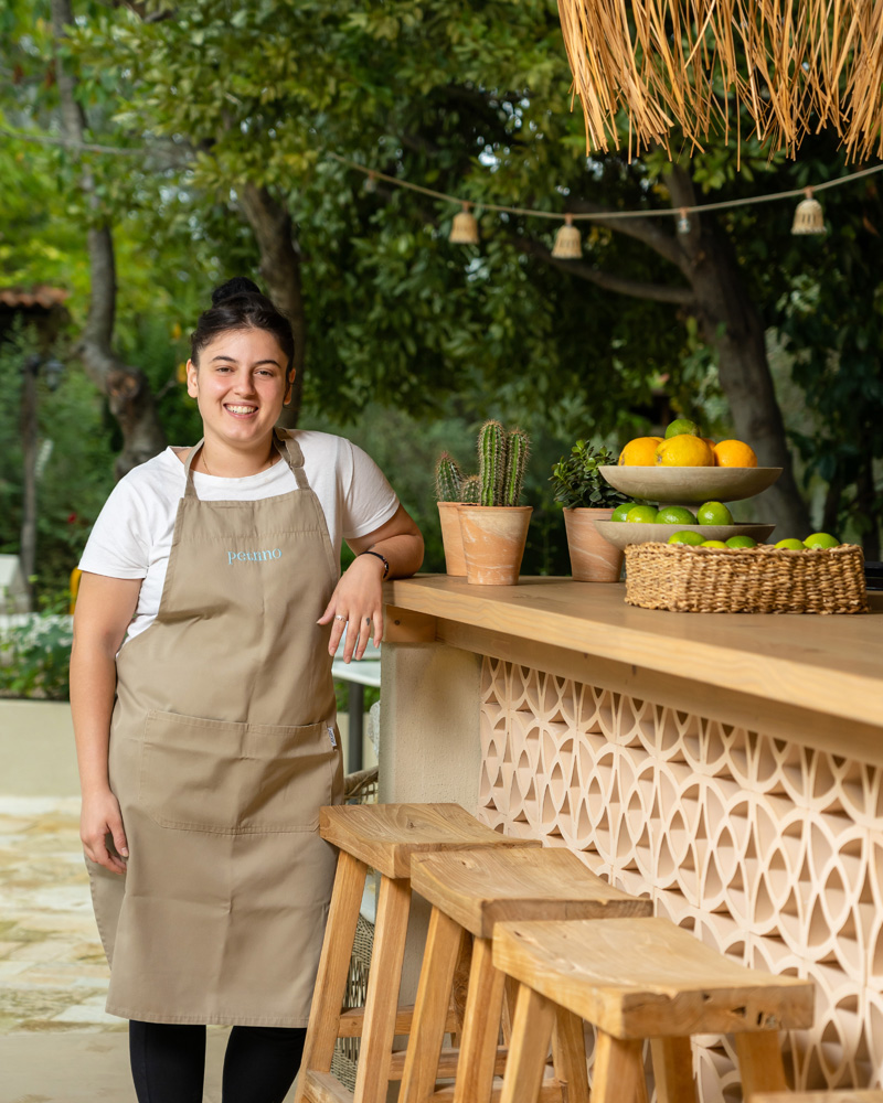 Bartender beside the pool bar
